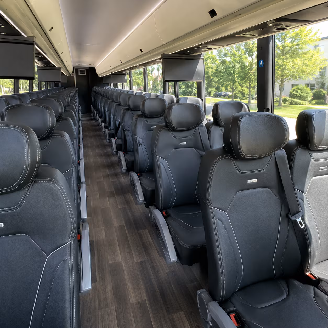 vista 56 passenger charter bus inside